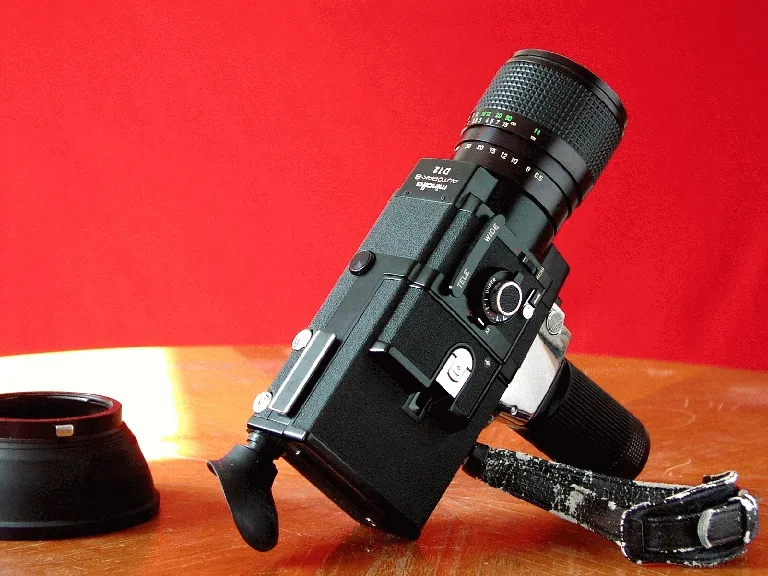 Minolta Autopak 8 D 12
